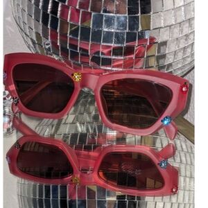 Matte pink sunglasses with colorful flower rhinestones
